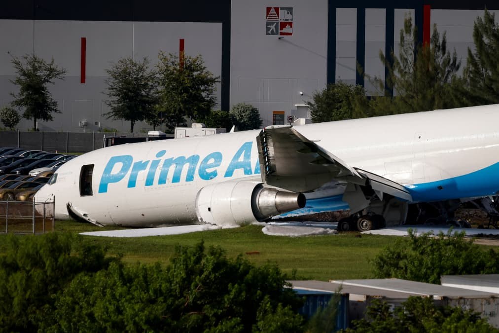 Crashed Amazon cargo jet struck two vehicles, ended up 1,300 feet past runway, NTSB says
