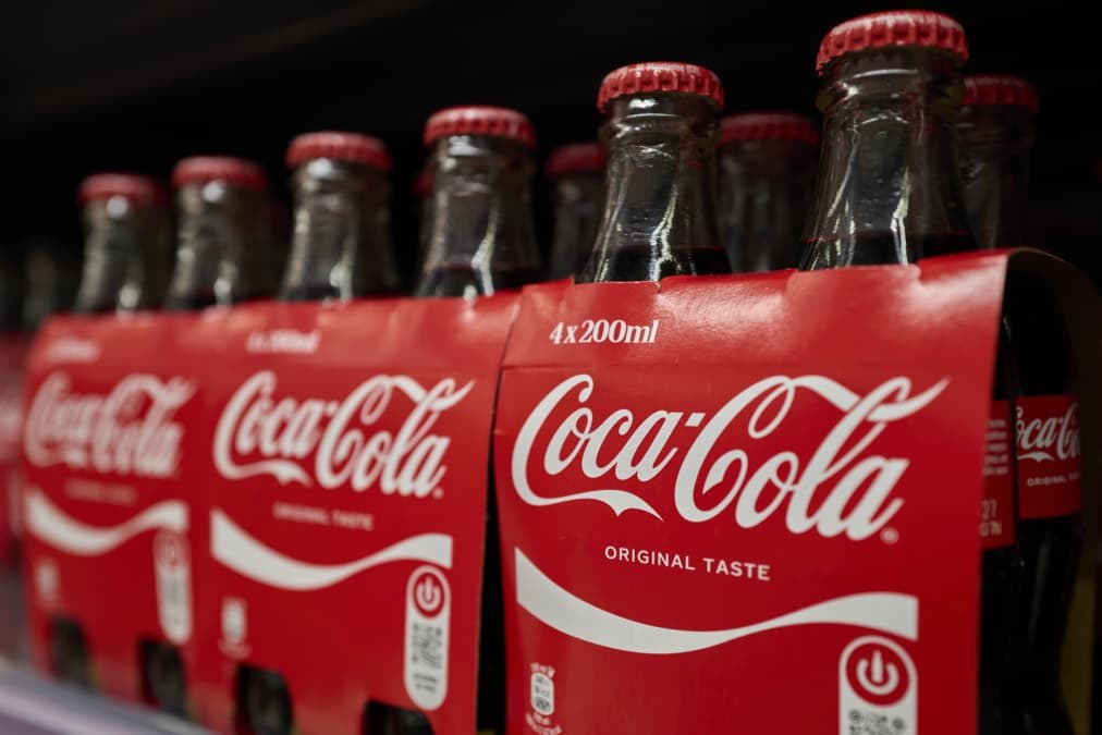 Coca-Cola hikes earnings outlook, even as it sees lackluster demand in North America